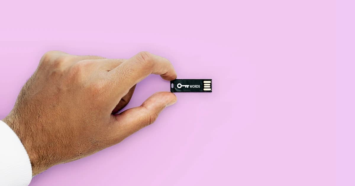 Hand holding a keyword stick